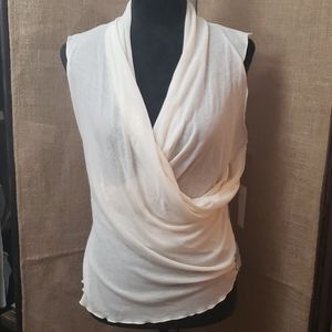 Sleeveless, wrap blouse.